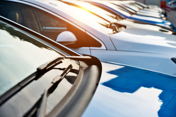 new cars parking at dealership - fleet of vehicles imagens e fotografias de stock