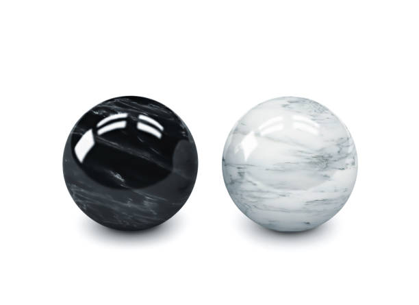 istock Black and white polished stone spheres, meditation balls isolated on white 1093896776