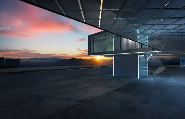 Photo of Perspective view of empty cement floor with steel and glass modern building exterior