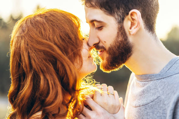 istock Pretty young romantic couple spend time together outdoor. 1093900708