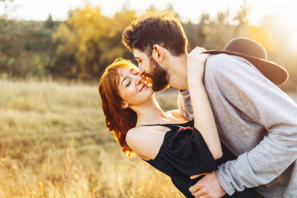 istock Pretty young romantic couple spend time together outdoor. 1093900754