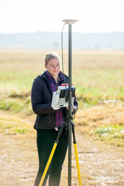 istock Female Surveyor Preparing GPS on Field 1093901304