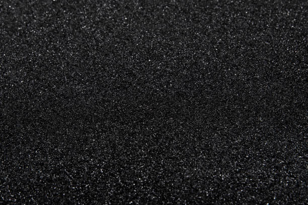 Black abstract background with defocused area. The texture of black stone (minerals) crumb. Black abstract background with defocused area. Top view. gravel photos stock pictures, royalty-free photos & images