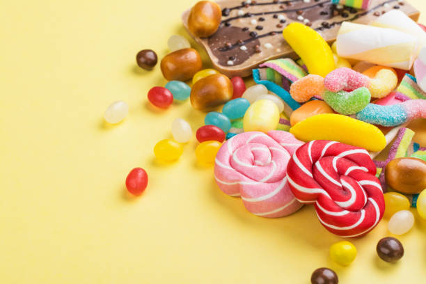 istock Candies, lollipops, jelly worms 1093907660