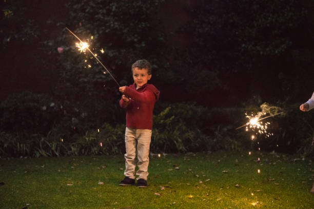 istock Boys holding spraklers for New Year's Eve 1093909564