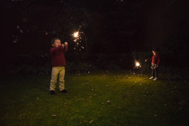 istock Boys holding spraklers for New Year's Eve 1093909690