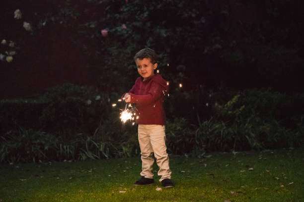 istock Boys holding spraklers for New Year's Eve 1093909702