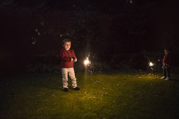 istock Boys holding spraklers for New Year's Eve 1093909706