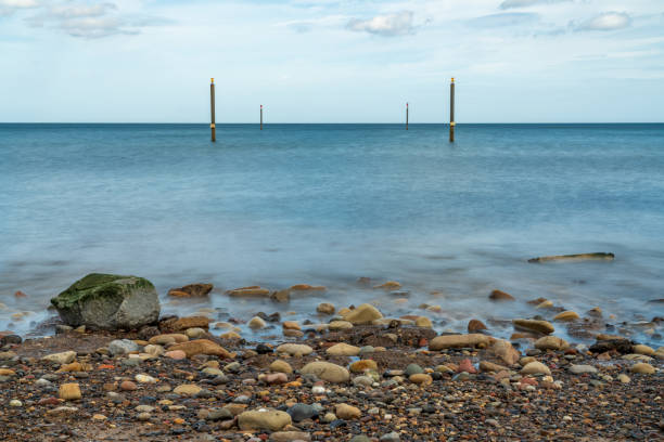 Piles in the North Sea, seen from North Beach in Cambois near Blyth, Northumberland, England, UK