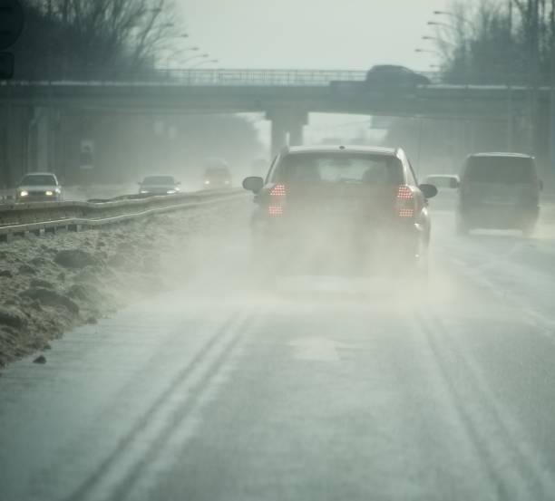 istock Water mist behind a car on a highway 1093911840
