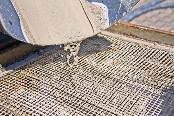 istock Fresh liquid concrete pouring from truck 1093911928