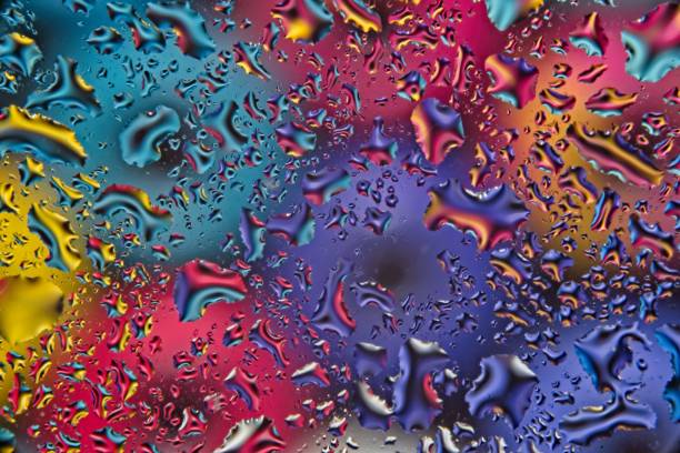 istock Colorful background blured and disorted by water drops 1093912354