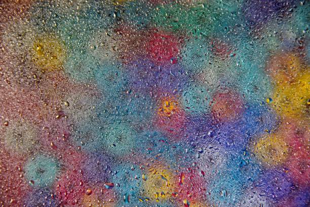 istock Colorful background blured and disorted by water drops 1093912366