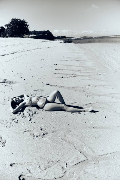 istock Slim woman enjoying on a sandy tropical beach. 1093912698