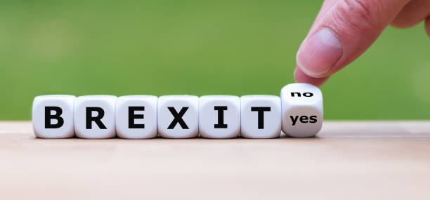 istock Hand turns a dice and changes the word 