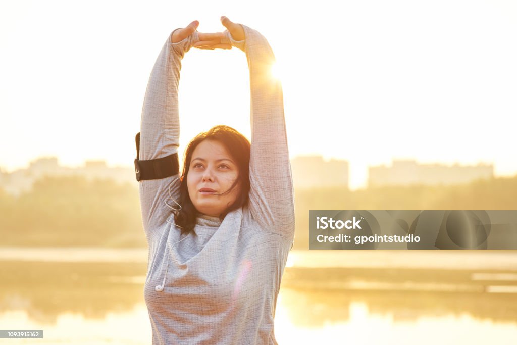 Morning exercising surrounded by nature Winter Stock Photo