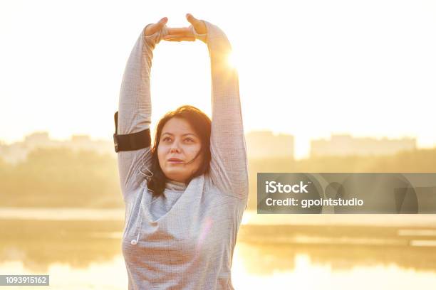 Morning Exercising Surrounded By Nature Stock Photo - Download Image Now - Winter, Exercising, Overweight