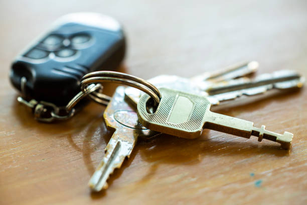 istock Old keys with remote on wooden texture, background, Close up & Macro shot, Selective focus 1093918178