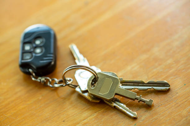 istock Old keys with remote on wooden texture, background, Close up & Macro shot, Selective focus 1093918234