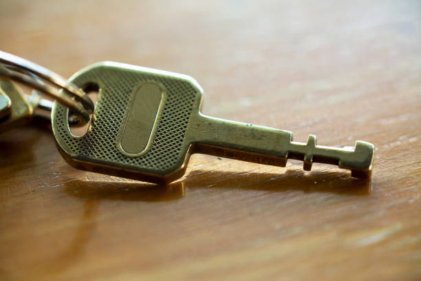 istock Old key on wooden texture, background, Close up & Macro shot, Selective focus 1093922286