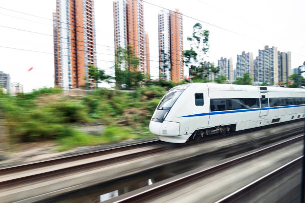 istock High speed train driving in the city 1093925698