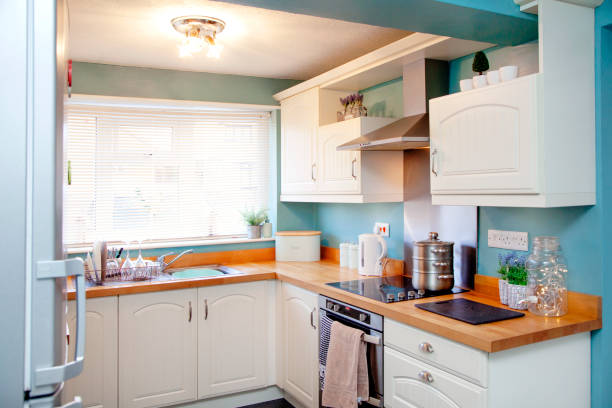 istock Kitchen with glasses and plates on a draining board 1093929682