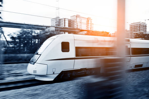 istock High speed train driving in the city 1093932940