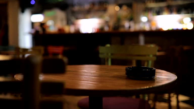 Ashtray on table in pub