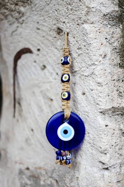 istock Amulet the blue turkish evel eye on wall. 1093938346