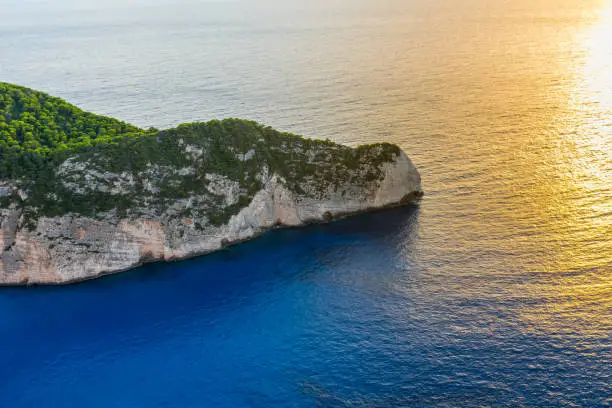 Photo of Greece, Zakynthos, Cliffy agios georgios landscape in beautiful magic sunset mood