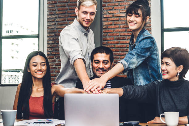 istock Successful of group business people stack and putting their hands together at office.Friendship teamwork concept 1093944766