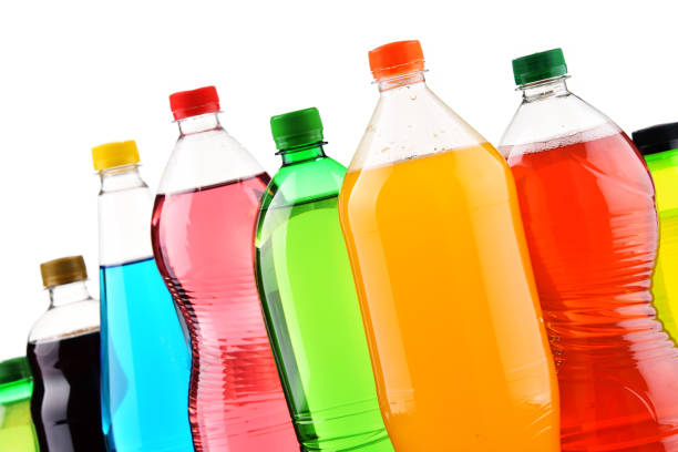 istock Plastic bottles of assorted carbonated soft drinks over white 1093948300