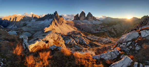 istock Colorful sunset mountain landcape panorama range in Tre Cime di Lavaredo.Dolomites. 1093958280