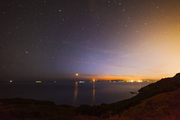 istock Starry night over the sea in Sardinia coastline 1093968112