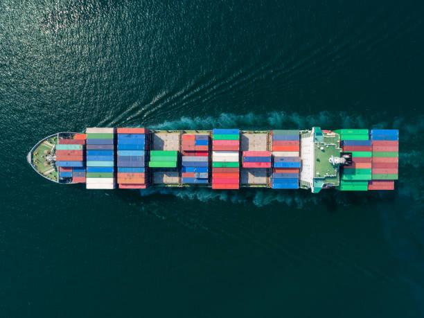 istock Aerial top view container ship full load container for logistics import export, shipping or transportation concept background. 1093969774