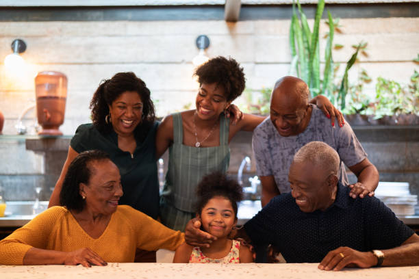 istock Multi-Generation hispanic-afro family at home 1093970968