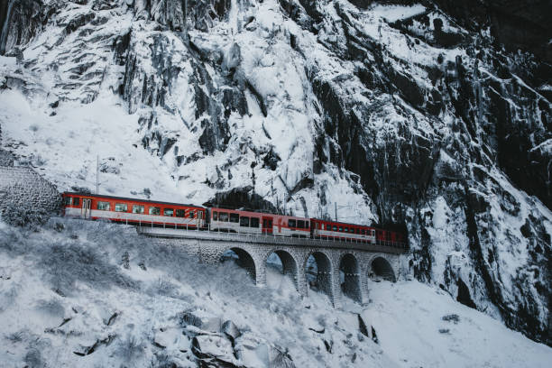 Train riding through viaduct in Switzerland
