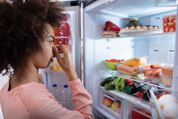 istock Woman Recognizing Bad Smell From The Refrigerator 1093971888