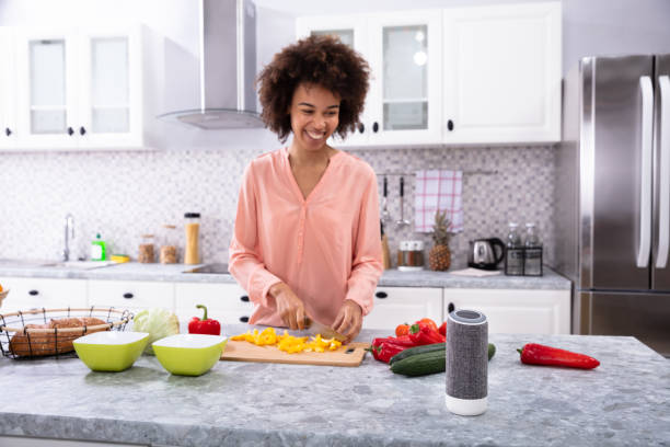 istock Smiling Woman Cutting Vegetables On Chopping Board 1093972128