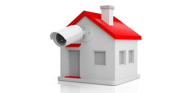 istock Security Camera CCTV on a small house isolated on white background. 3d illustration 1093972288