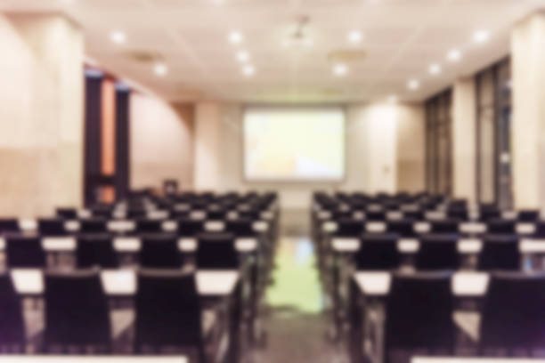 istock Blurred background of conference hall or seminar room. 1093974228