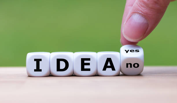 istock Have an idea? Hand turns a dice and changes the word 
