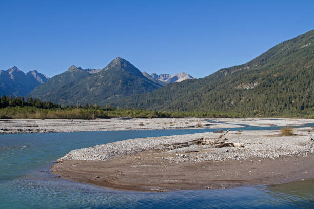 istock broad river valley of the Lech in Tyrol 1093977650