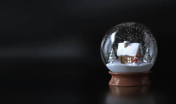 Photo of Snow globe with a snowman , snowman and green trees. Christmas snow globe - dark background - 3D rendering