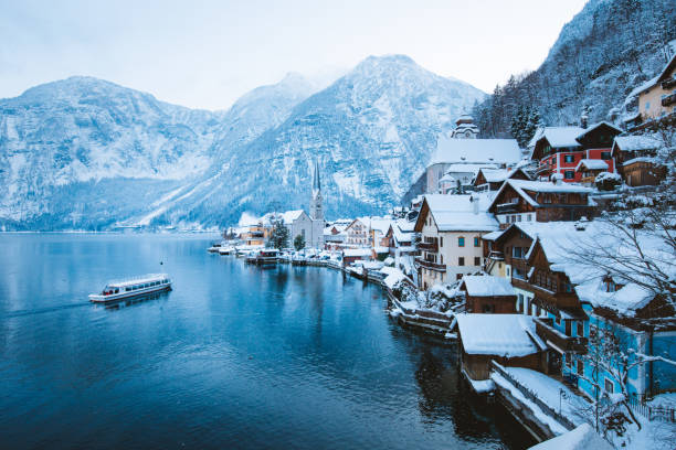 istock Hallstatt with ship in winter twilight, Salzkammergut, Austria 1093981308