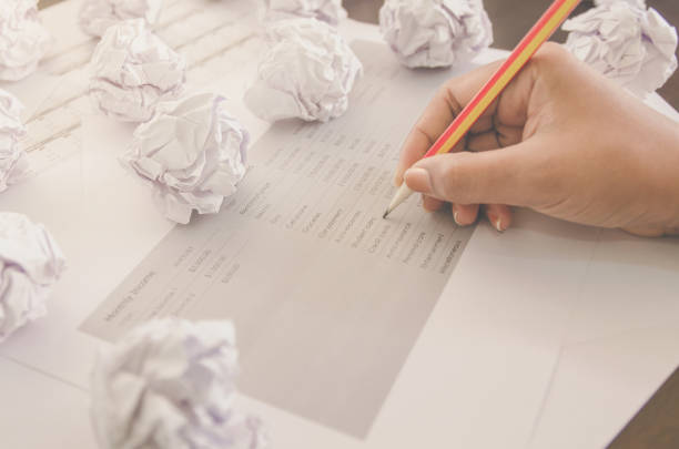 istock No idea and fail concept - Human hand holding crumpled paper and trash. 1093981634