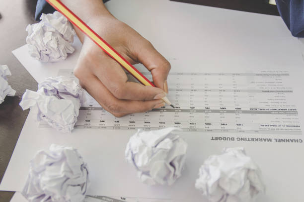 istock No idea and fail concept - Human hand holding crumpled paper and trash. 1093981818