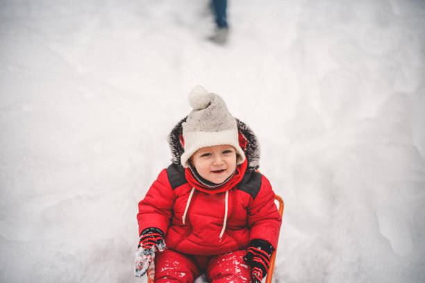 istock Baby boy enjoying snow 1093982816