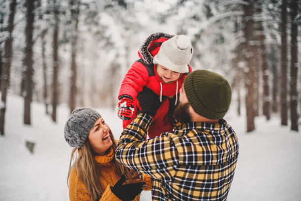 istock Happy family enjoying snow 1093984768