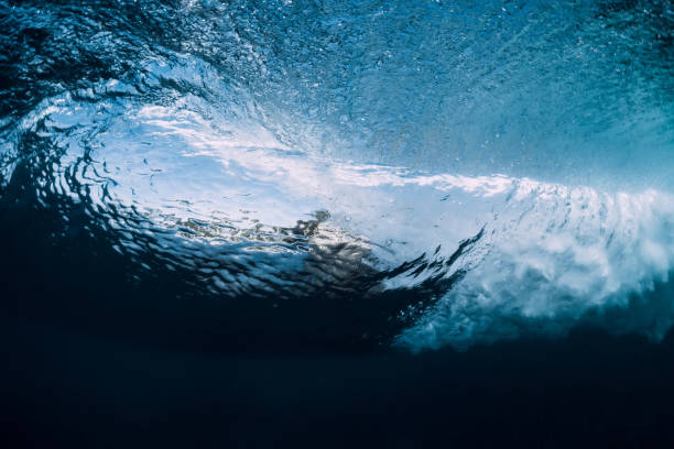 istock Underwater crystal wave. Perfect barrel wave crashing in ocean. 1093984798